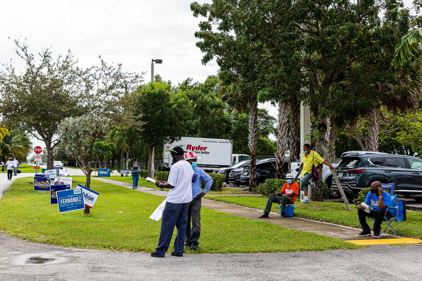 Campaign Workers lined the polling entrance in Florida City.